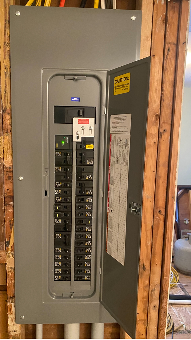 Professional electrician working on electrical panel